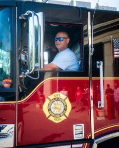 Richard Sahl in a fire truck.